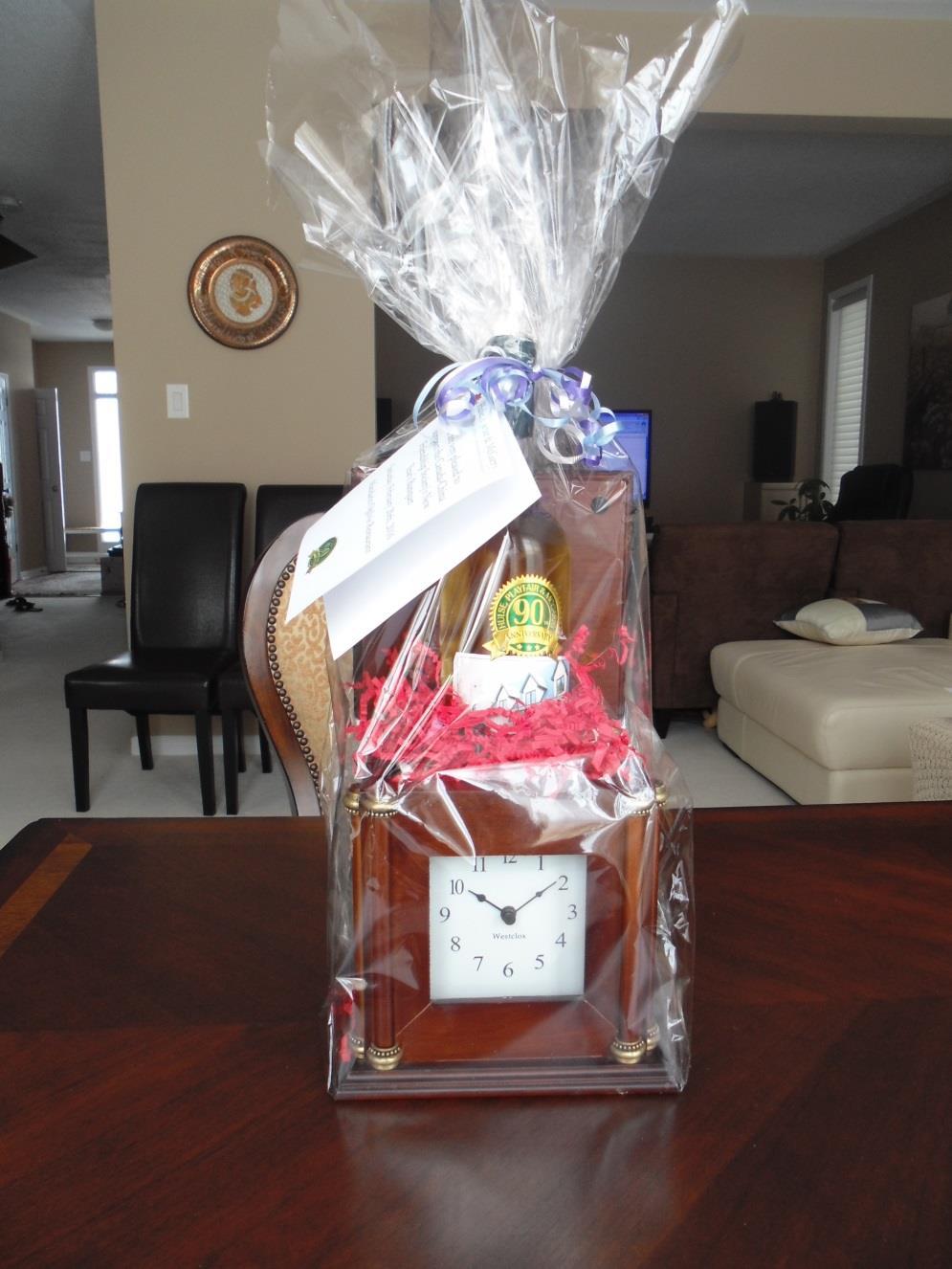 #21 Wine and Clock Box This gift set includes a bottle of wine and a beautiful box clock.
