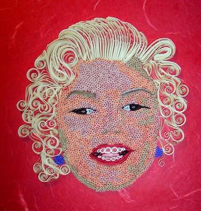 She has been quilling for three years and is now doing solo shows with her imaginative and detailed work.