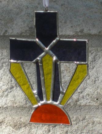 Cross with sun and rays - $20.