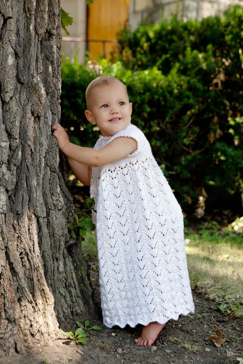 Lily of the Valley Christening Gown By Premier Yarns Design Team Level: Intermediate SIZES 3 (6, 12) months FINISHED MEASUREMENTS Chest: 18 (19, 20) Length: 21¼ (21½, 21¾) MATERIALS Premier Yarns