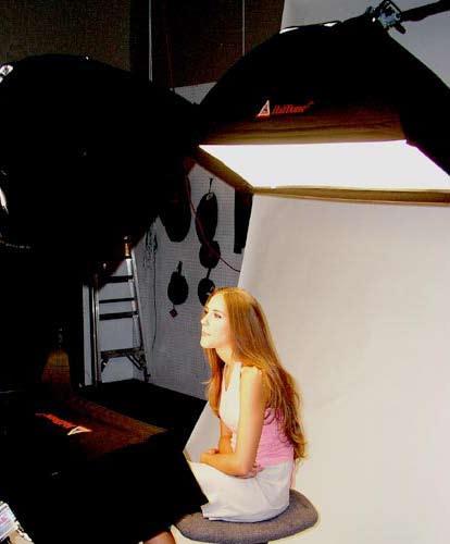 In this set up, we added a 500 watt strobe with a soft box on another