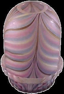 Iorio fairy lamps are listed on ebay infrequently, however, the above example in a multi-colored threaded pattern with matching base was offered for auction in August 2000.