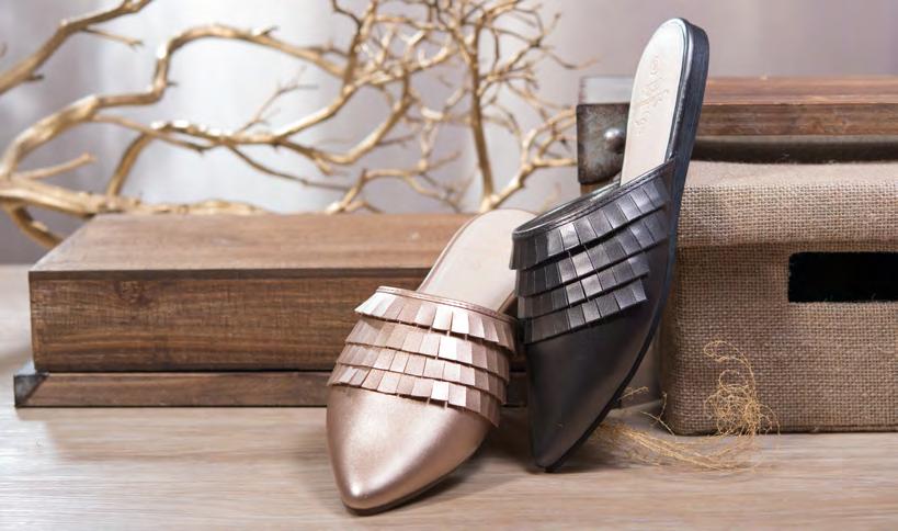 RUFFLE DETAIL CREATES A CHIC FEMININE LOOK Gun Metal WITH THESE COMFY SUEDED MULES. Ruffle $15.00 each $135.