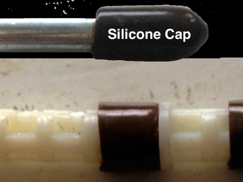 Step 13 Alternative to paperclip I used silicon caps (for 5 mm diameter shelf pins) such as the one shown here. Cut the closed end to obtain ~ 0.