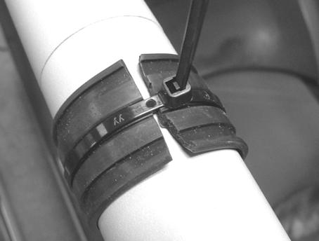 ) Wrap the Secure Grip Band around the intended Install the Mounting Base over the nylon tie mounting pole and cut to fit. Do not overlap ends or knuckle.