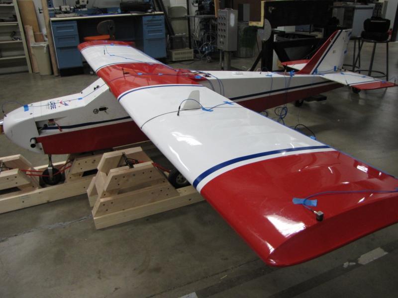 The instrumented Super Hauler in the test rig can be seen in Figure 3. Tests were performed with and without the wing pods installed.