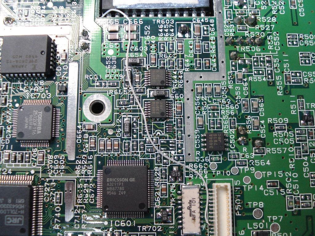 7.2 Next you will need to solder the teeny tiny wire wrap wire to P501 pin 25 on the bottom side of the logic board. Make sure not to connect to the CX702 side it is close space but just be careful.
