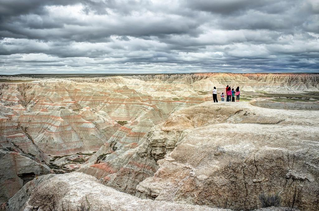 This area is known as the Badlands of South Dakota. It is located within a several hour drive from Mount Rushmore and is a National Park of the United States.