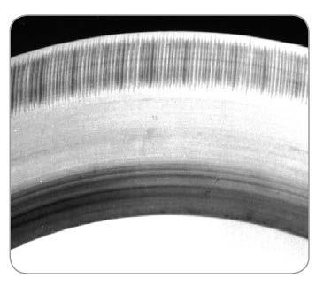 Below the re-hardened layer there is a layer of annealed material, which is softer than the surrounding material. Fig.5 Fluting on inner ring raceway of bearing 2.
