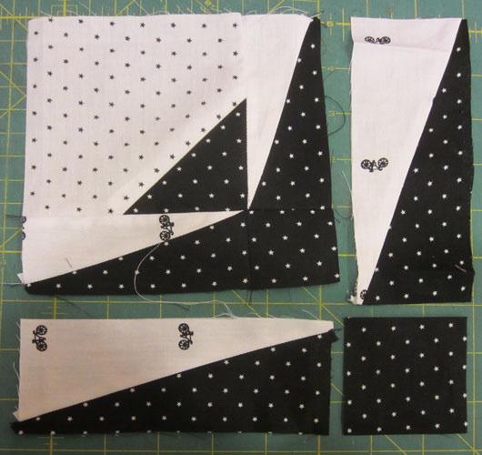 Sew 1 7 / 8 Black square to end of one rectangle first before joining this strip to