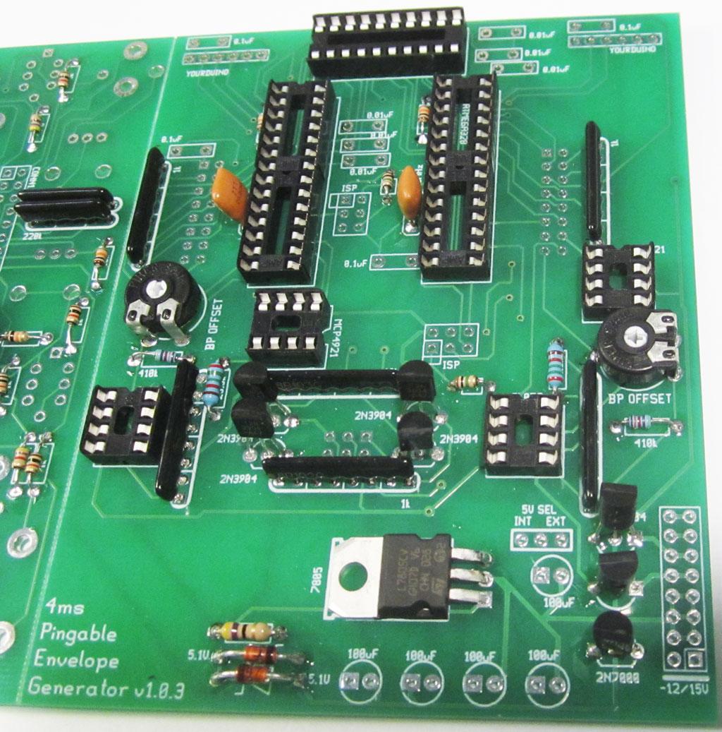 Step 4: Transistors, Voltage Regulator, Resonators, Trimpots: Insert and solder the transistors.
