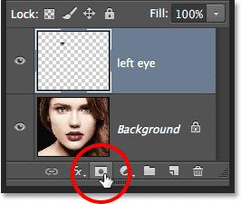 Clicking the Layer Mask icon. This adds a layer mask to the "left eye" layer, and because we had a selection active, Photoshop used the selection to create the mask.