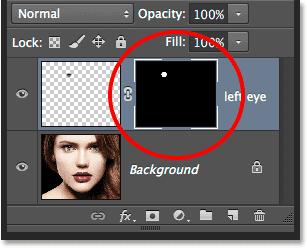 White areas on a layer mask represent the areas on the layer that are visible in the document, while black represents areas that are hidden: The layer mask thumbnail shows us the mask that's been