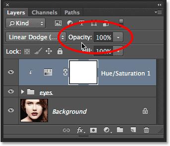 lowering the adjustment layer's opacity value.