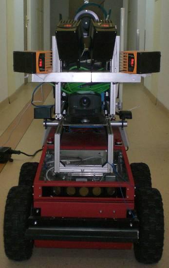 Figure 3: Autonomous mobile robot equipped with 3D sensors for local navigation and 3D map building.