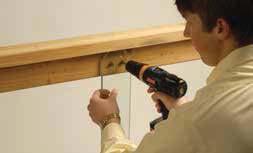 Drive each screw until the rubber grommet begins to mushroom. Do not over-tighten. Step 2: Attach the first baluster on-center of the center line using four of the screws provided.