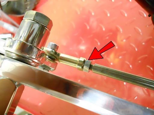 Adjust the Shifter Pedal height by turning the linkage one way or the other. After the height is adjusted to the desired position, tighten the nut against the Spherical Rod End. That s it!