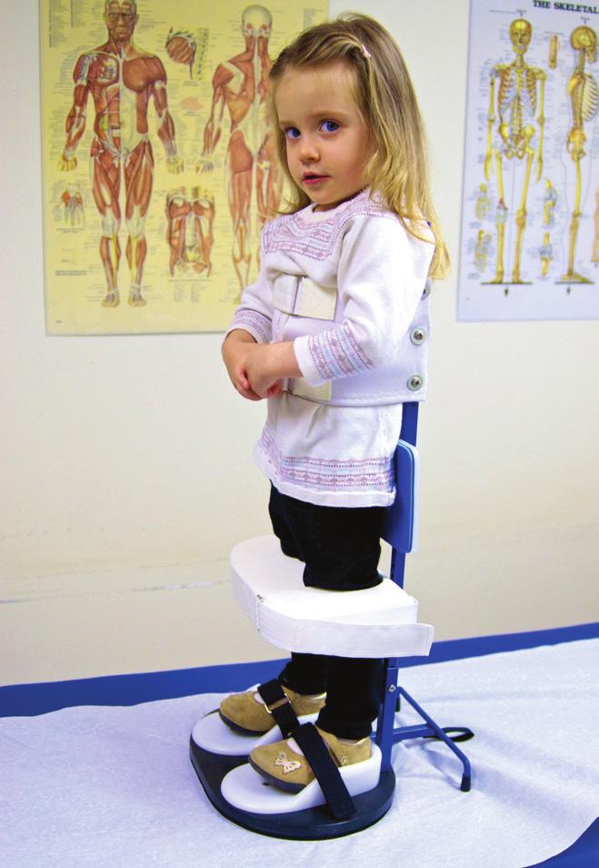 Fitting and assembly procedure Place child in standing frame. Position near table with toys so child can be supervised during play. Ensure anti-tip bar is in place.