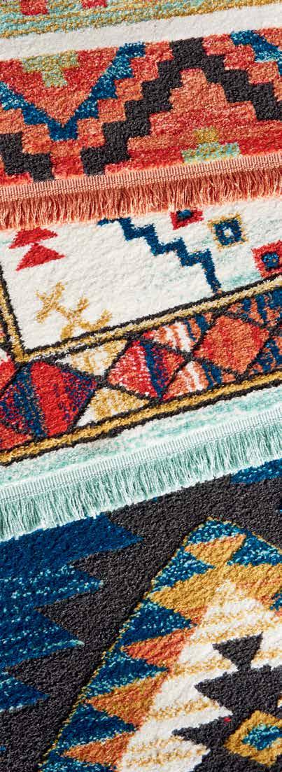 The bright transitional hues in these colorful rugs imbue their vivid geometric designs with a sense of animation, and make a stunning
