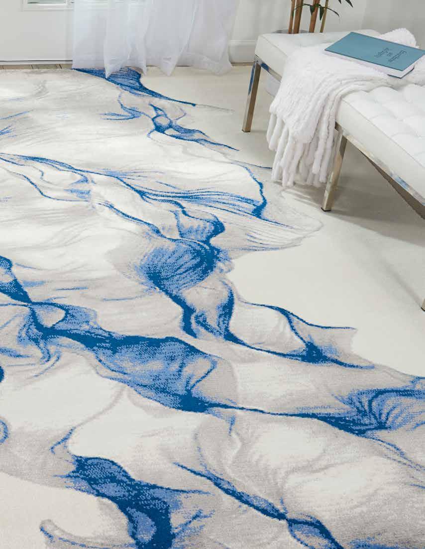 SHOWN TWI27 IVBLU TWILIGHT COLLECTION The Twilight collection area rugs feature dappled neutral colors and rich brights that reflect the soft and serene aura of early evening.