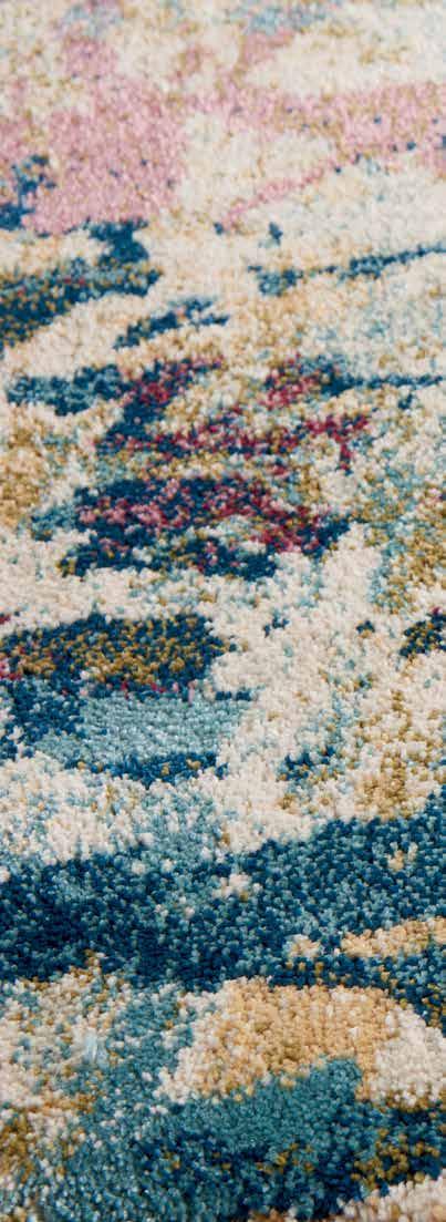 Persian floral patterns and abstract brush strokes play out on silky, plush pile, with distressed color effects to create a vintage
