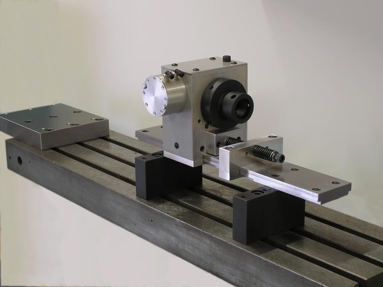 100% duty cycle. Production ready. An evolution of the previous Tail Stock, the adds the ability to coexist on the mill table with a typical mill vise.
