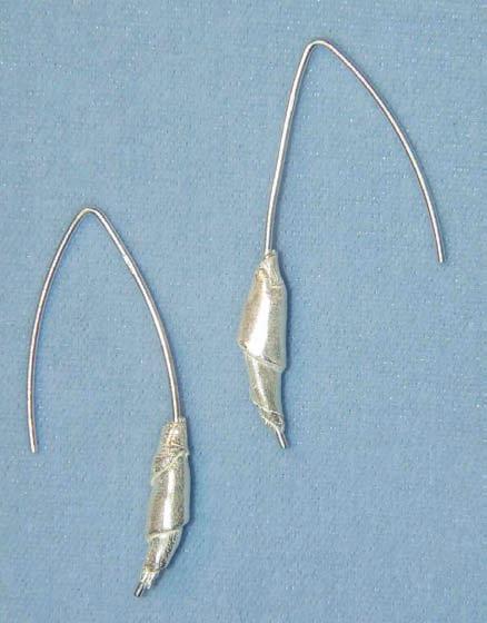 This time, instead of a straw, you wrap the clay around the ends of these fine silver V -style ear wires.