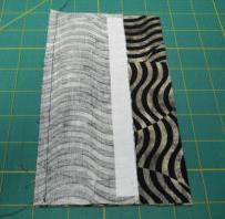high piece. Fold tape at inside edge on 6 piece & iron to crease fold.
