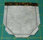 15 - Remove from hoop, trim 1/4 seams at sides & angled bottom.