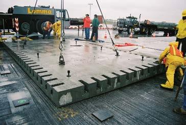 Figure 3.31. Installation of precast taxiway panels with leveling bolts at LaGuardia Airport. Figure 3.32.