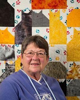 Pamela B. She started quilting because a quilt shop opened up close to where she lived.