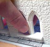 Make four of these. 21. Finally, glue the window edging and columns in. Then glue the decorative strips on.