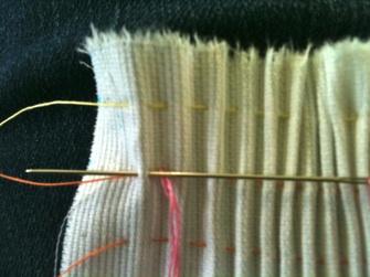 Stitch 1 -Cable Stitch Go through the first pleat, entering on the