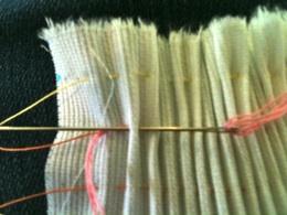 You will use the pleating thread as your guide.