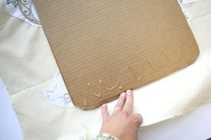 Using a pencil and measuring tape, outline your cardboard sheets to the dimensions of your suitcase. (I used the outside shape of the suitcase as a rough template.