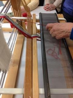 News Random Warp - On February 7th, Norma Westcott demonstrated random warping from the front of the loom. The demonstration used usual loom parts in unusual ways (plus a few curtain rods!