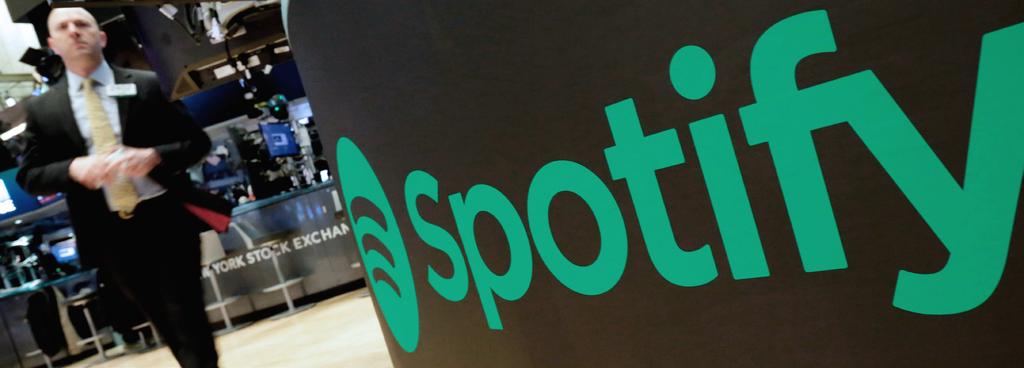 Above: Music streaming service Spotify being recognized on the day of its initial New York Stock Exchange listing those banks for setting the IPO price and stepping into the market to buy the stock