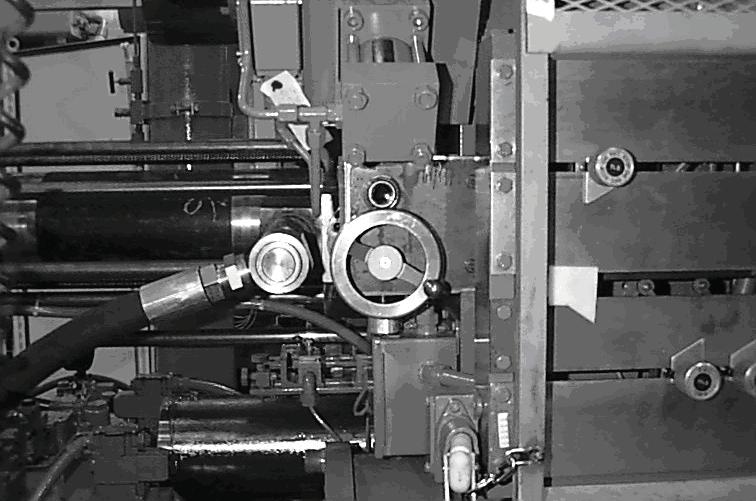 the accumulator. Some of the valves may be manually operated. For example, the valves controlling the speeds of injection or die closing may be fi tted with large hand wheels.