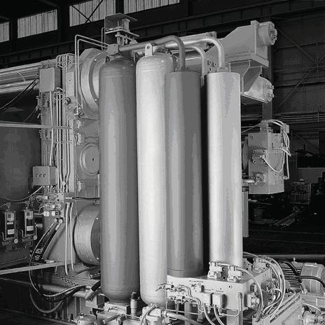 The Die Casting Machine (DCM) Fig. 3-26. Several accumulators located near the "rear" end of a large die casting machine. Fig. 3-27.