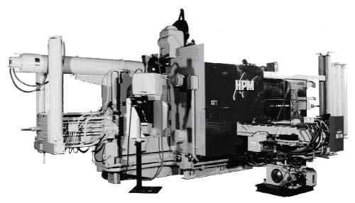 Controls ALUMINUM DCM AND WORKCELL Fig. 5-4. A 1200-ton aluminum DCM in a workcell with a reciprocator, auto-ladle, and extractor robot.