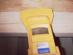Slide the stud finder along the rafters or truss top chord and mark the rafter, truss or roof deck every time you find a fastener.