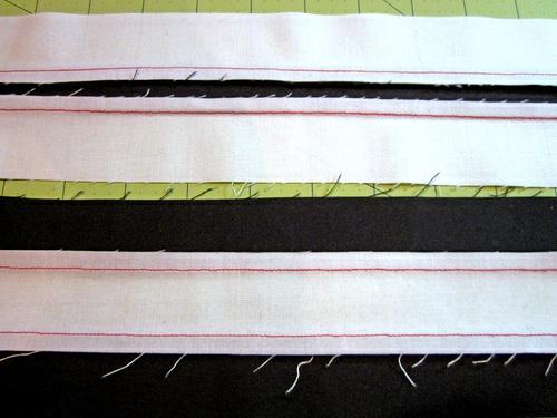 5. Using your rotary cutter, quilt ruler and cutting mat, subcut the sewn strips sections in 1½" widths.