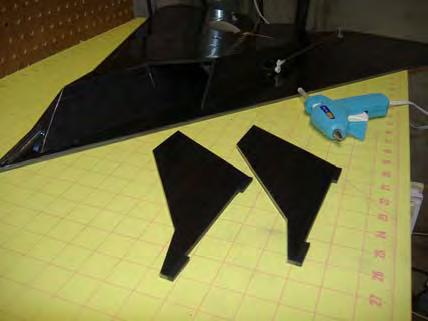 down. Hot glue rear tail stabilizes in place.