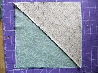Lay a dark and light square right sides together into 4 pairs. Stitch ¼ on either side of the drawn line.