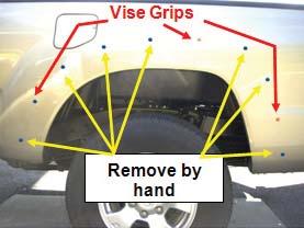 Remove three clips from fender using vise grips,