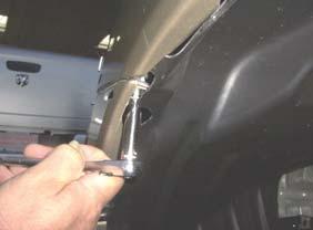 Using a 5/16 bit, drill holes at indents located at
