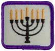 - Jewish Religion - Stage 4 1. R1013 2. POR (1983) 3. 1983-4. Rectangular; white, cotton: Menorah in black stitching; candles in yellow stitching; edge binding in red stitching.