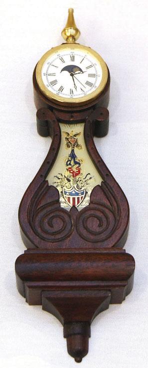 Class 20, third place: Wood Carving This miniature lyre clock is entirely handmade with working  Edward