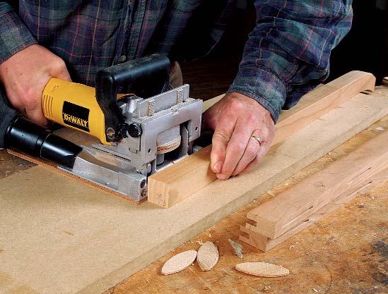 A dedicated mortising machine makes quick work of cutting all 2 mortises (below). drawers or even the overall dimensions of the cabinet without changing its look very much.