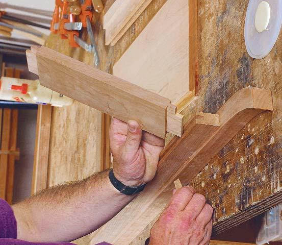 Now is a good time to cut the mortises for the knife hinges and to plunge a groove in the back of the bottom drawer rail with a biscuit joiner for the intermediate drawer support (both operations